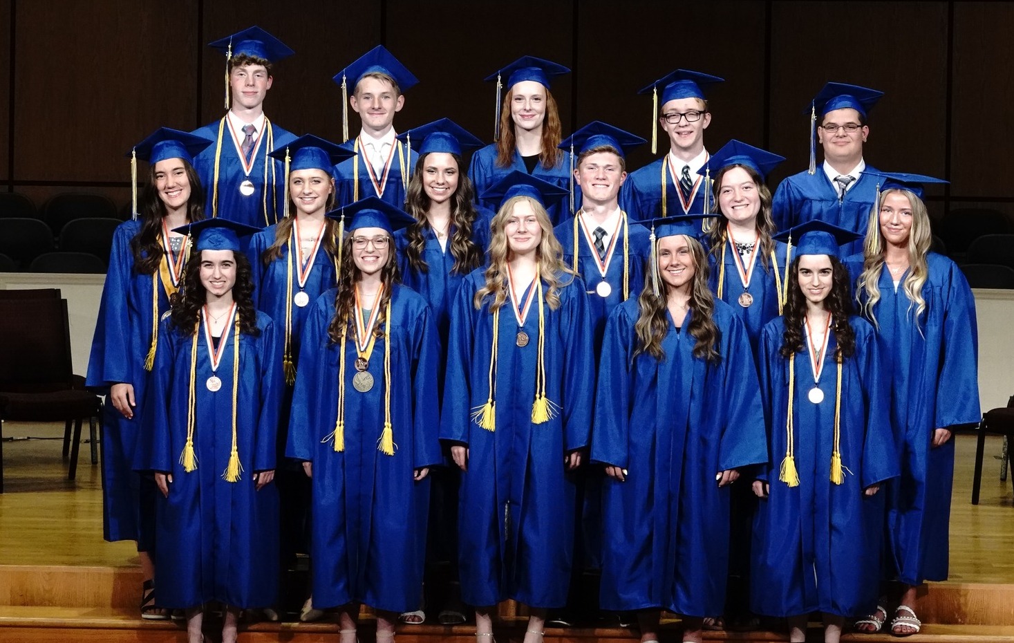 Christian school graduates in cap and gown